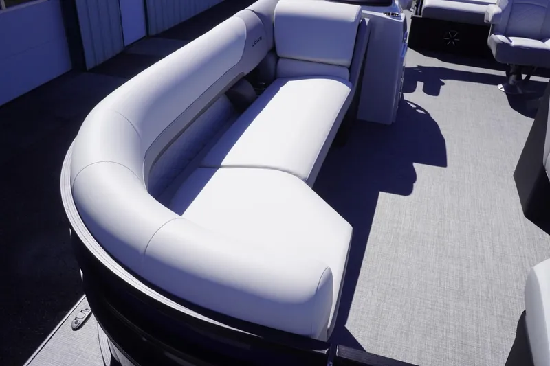 Slide: The Image of 2025 Lowe SS 230 DL pontoon boat with sleek, modern seating design. - 29