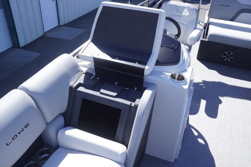 Slide: The Image of 2025 Lowe SS 230 DL boat interior with modern seating and control panel. - 36