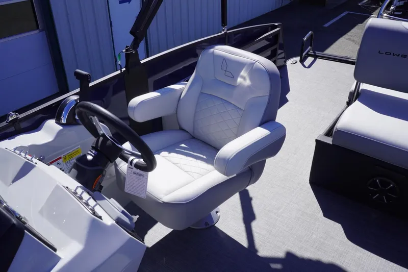 Slide: The Image of Captain's chair on 2025 Lowe SS 230 DL pontoon boat, featuring modern design and comfort. - 38