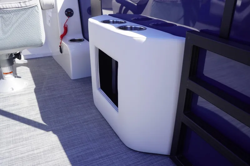 Slide: The Image of Interior of 2025 Lowe SS 230 DL boat with cup holders and seating. - 46