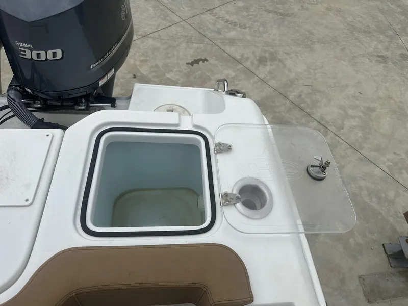 Slide: The Image of 2020 Sea Hunt Gamefish 30 boat with open coffin box and Yamaha 300 engine. - 16