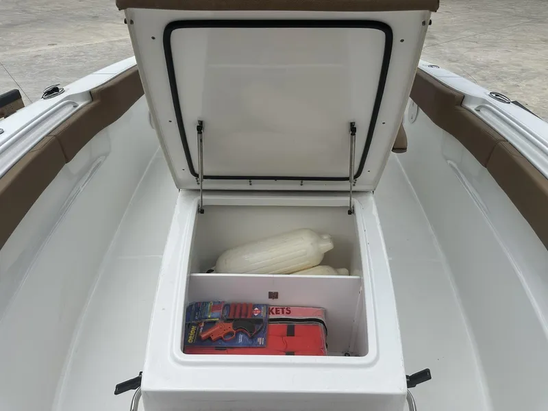 Slide: The Image of 2020 Sea Hunt Gamefish 30 with Coffin Box open, showing storage with safety equipment. - 34