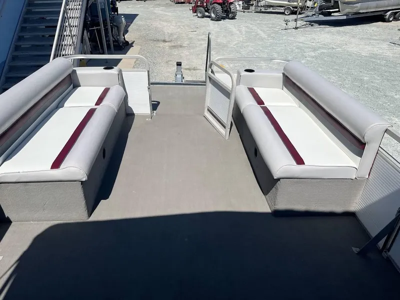 Slide: The Image of 1991 GODFREY MARINE 24 Executive boat interior with white and red seating. - 1