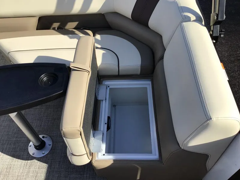 Slide: The Image of Luxurious seating with built-in storage on 2025 G3 Select 322RF boat. - 28