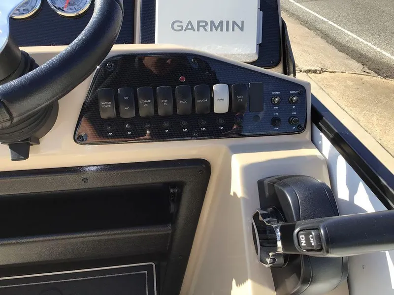 Slide: The Image of Control panel of 2025 G3 Select 322RF boat with Garmin navigation system. - 33