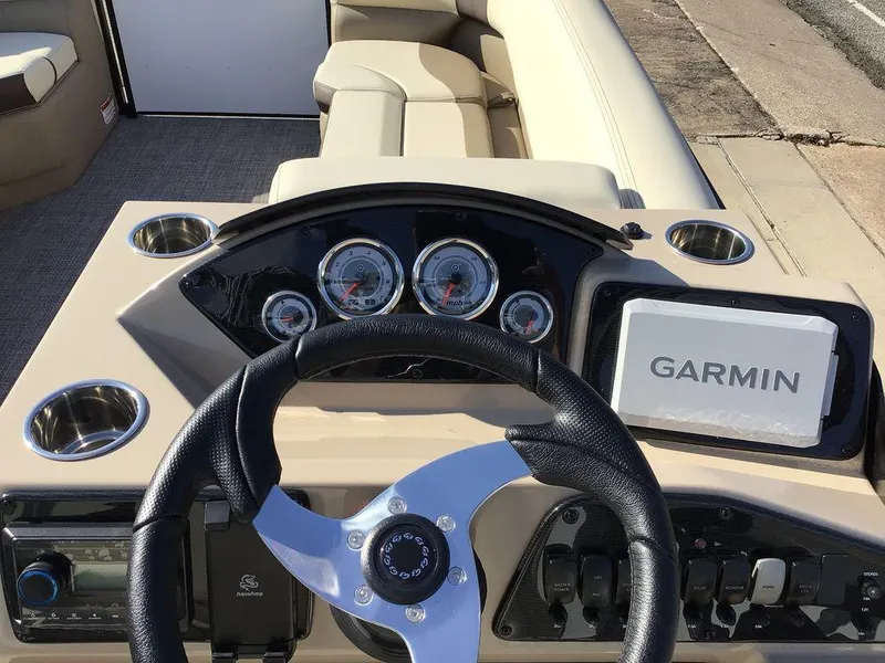 Slide: The Image of Steering console of 2025 G3 Select 322RF boat with Garmin navigation system. - 41