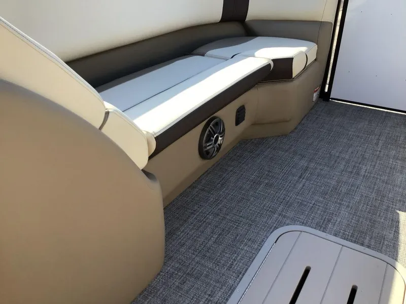 Slide: The Image of Interior seating of 2025 G3 Select 322RF boat with beige and white upholstery. - 46