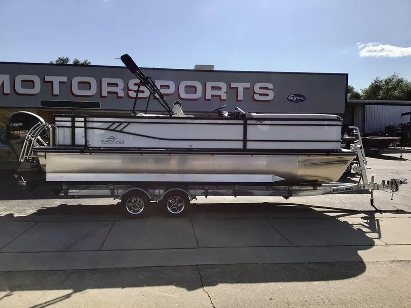 Slide: The Image of 2025 G3 Select 322RF pontoon boat on trailer at motorsports dealership. - 7