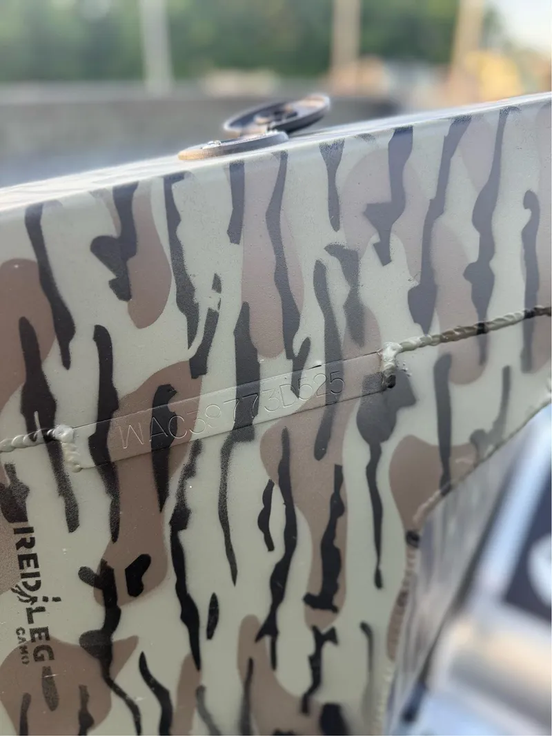 Slide: The Image of Camouflage pattern on 2025 EDGE BOATS 656 DB SPORTSMAN, featuring a visible serial number. - 9