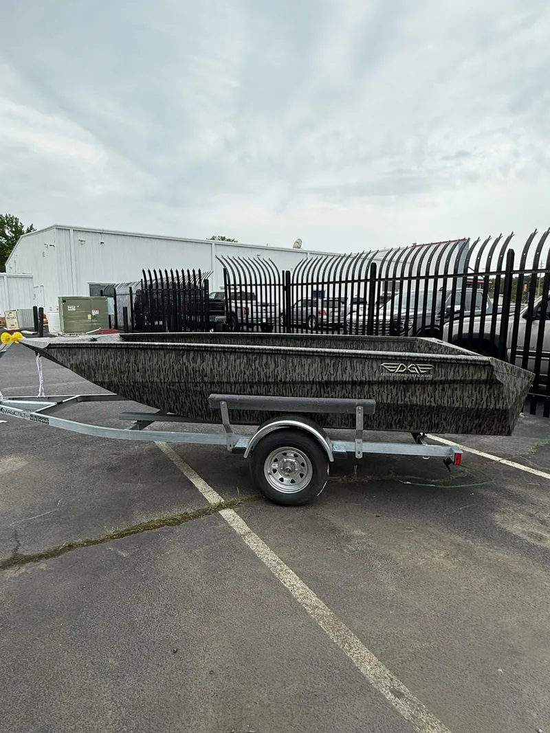 Slide: The Image of 2025 EDGE BOATS 553 Sportsman on trailer in parking lot. - 8