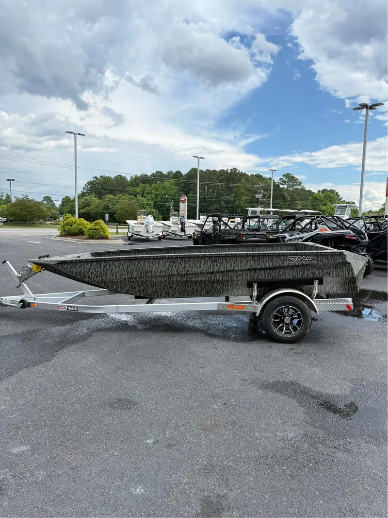 Slide: The Image of 2025 EDGE BOATS 753 on trailer, parked outdoors under cloudy sky. - 20