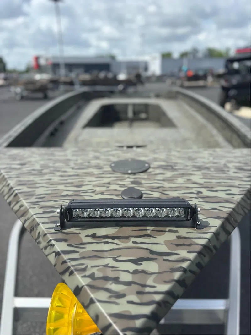 Slide: The Image of Camouflage-patterned EDGE BOATS 753, 2025 model, featuring a mounted LED light bar. - 7