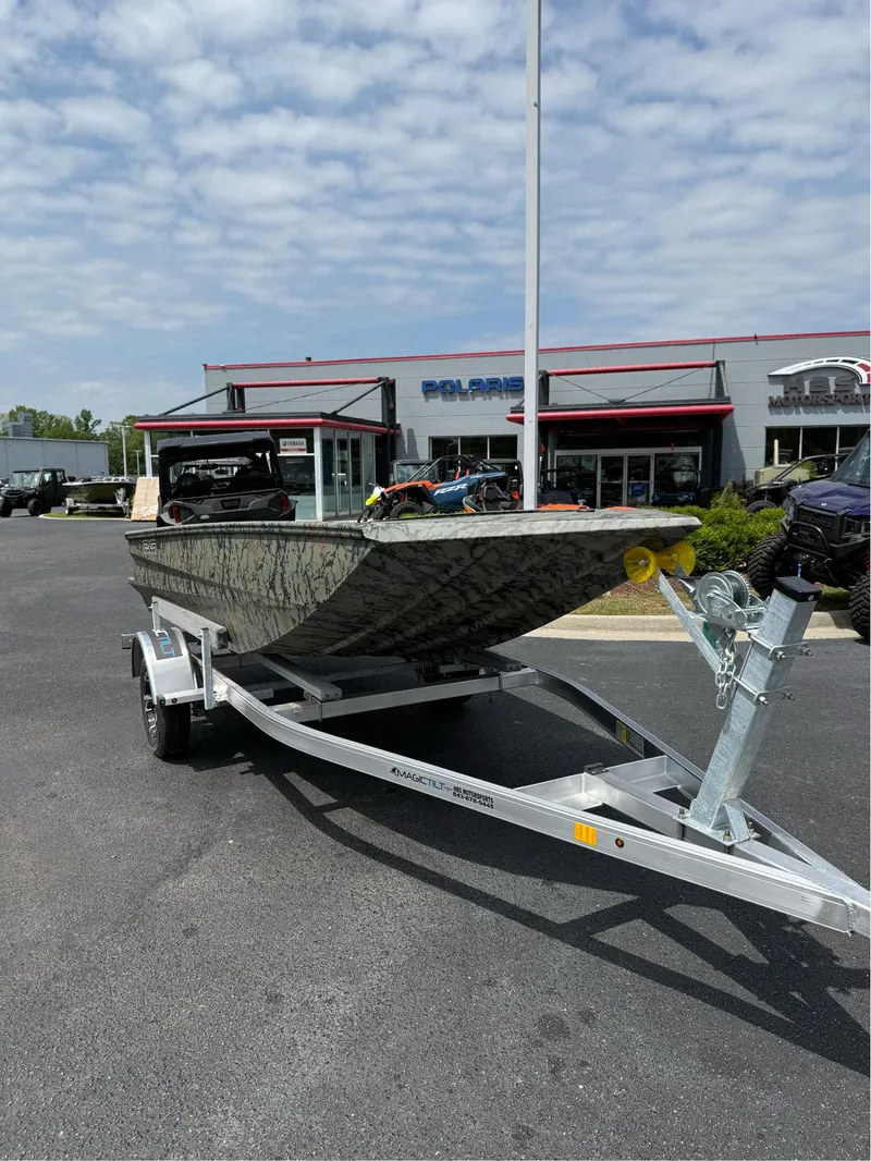 Slide: The Image of 2025 EDGE BOATS 656DB on trailer in dealership parking lot. - 10