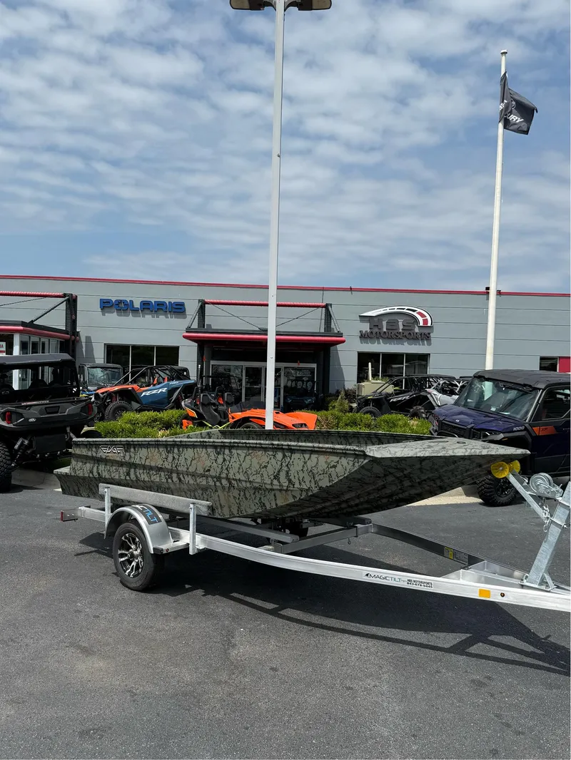 Slide: The Image of 2025 EDGE BOATS 656DB on trailer outside dealership with Polaris vehicles. - 11