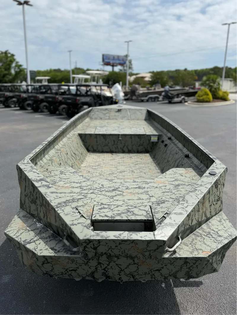 Slide: The Image of 2025 EDGE BOATS 656DB with camouflage design, displayed outdoors. - 3