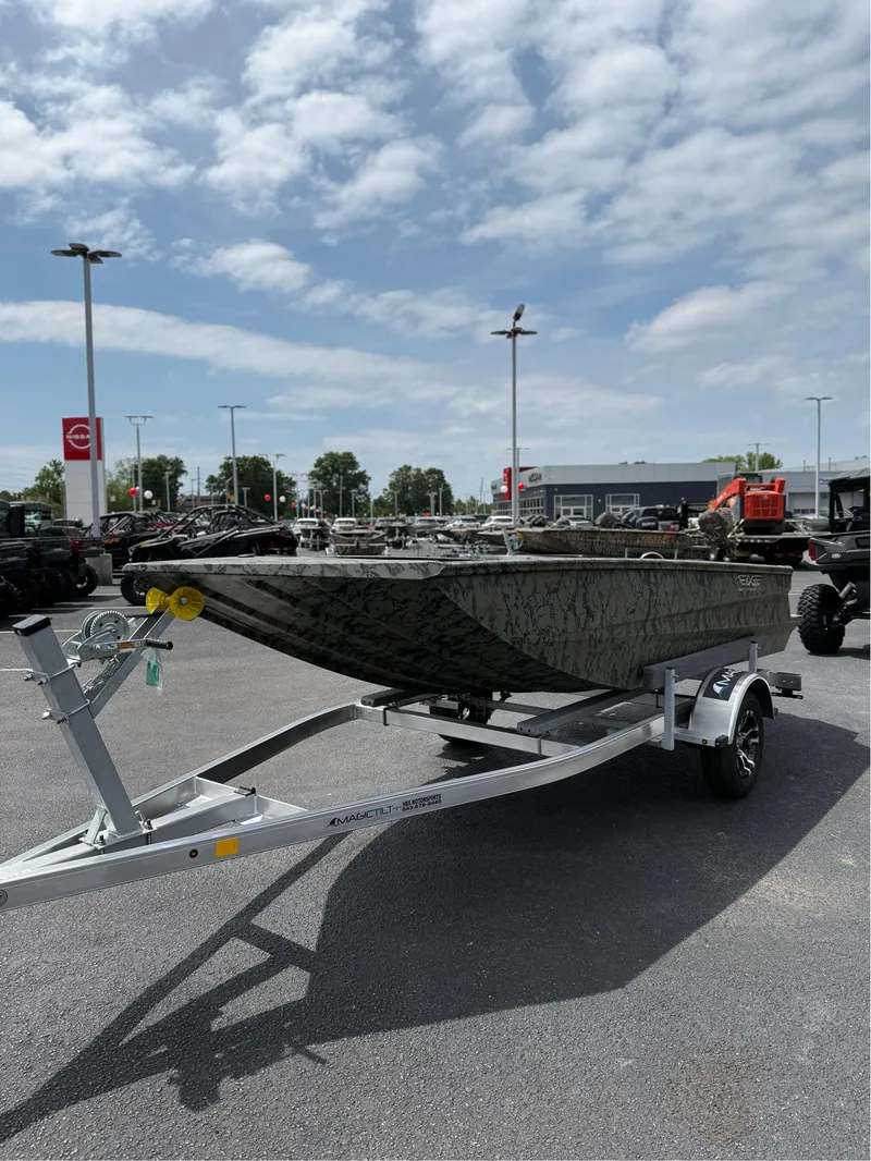 Slide: The Image of 2025 EDGE BOATS 656DB on trailer under cloudy sky at dealership. - 8