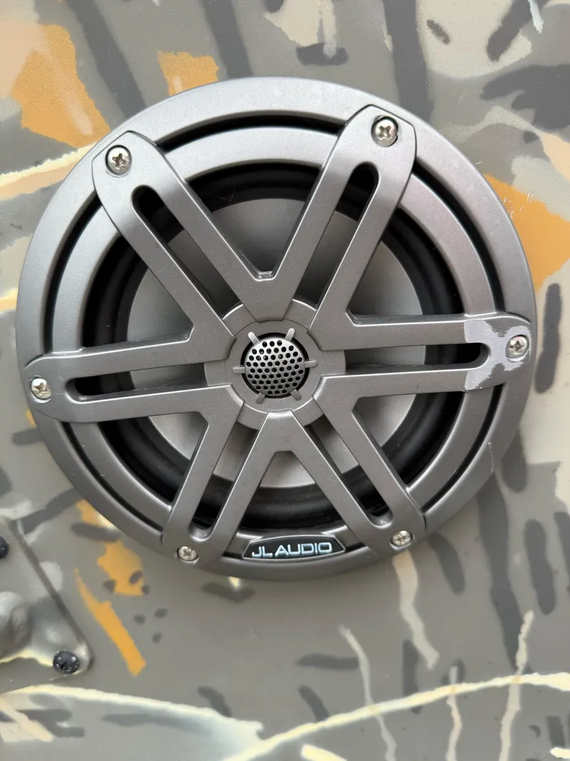 Slide: The Image of Close-up of JL Audio speaker on 2022 War Eagle 961 Blackhawk boat. - 33