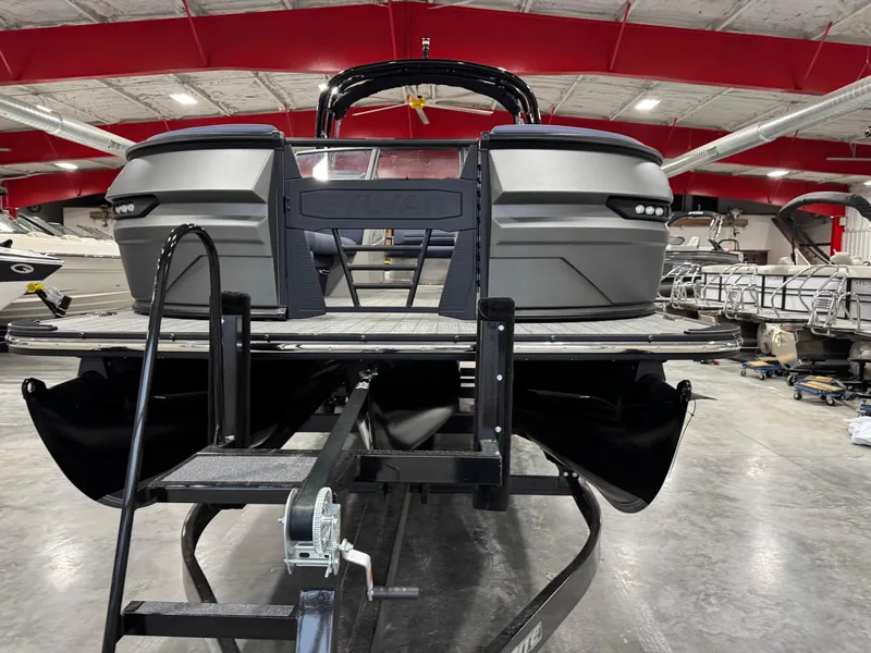Slide: The Image of 2025 Sylvan G5 boat on trailer in indoor showroom. - 5