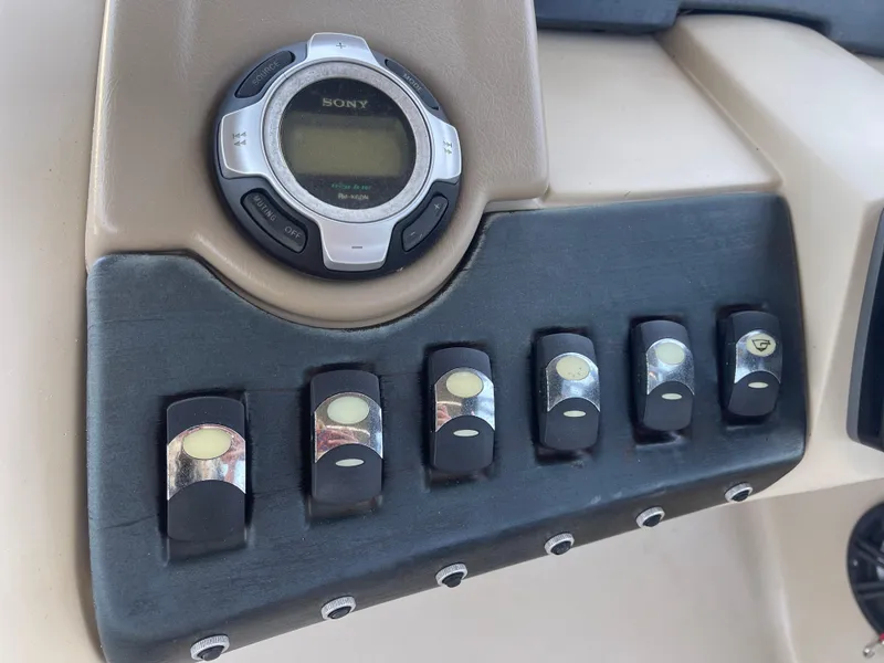 Slide: The Image of Control panel of a 2013 Bennington 22 R boat with Sony audio system. - 19