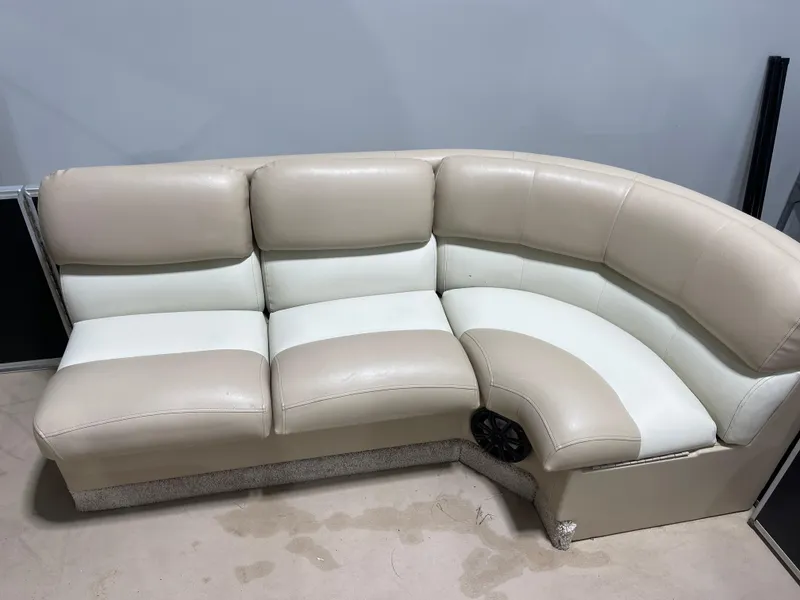 Slide: The Image of Beige and white leather seating on a 2013 Bennington 22 R boat. - 22