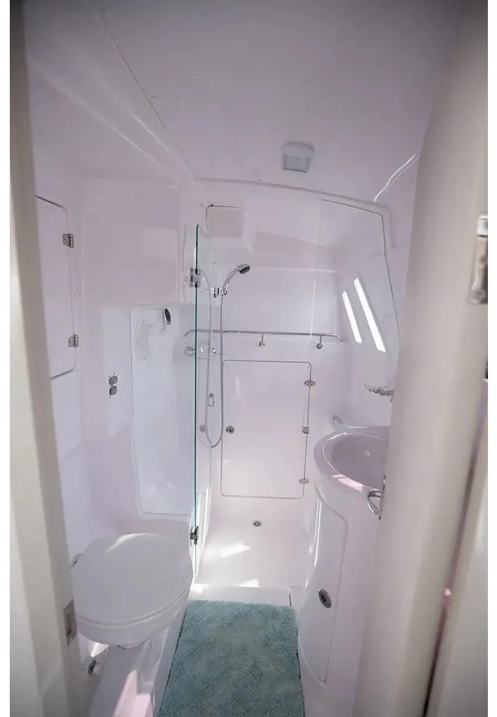 Slide: The Image of 2025 Seawind 1160 Lite yacht bathroom with modern fixtures and compact design. - 13