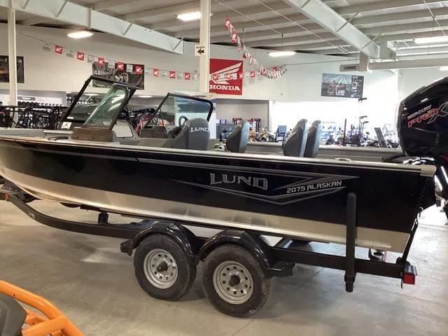 Slide: The Image of 2024 Lund 2075 Alaskan Sport boat on trailer in showroom. - 3