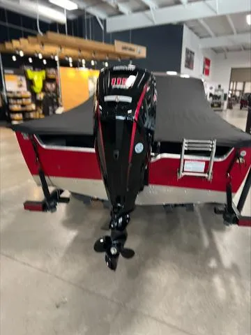 Slide: The Image of 2024 Lund 1875 Alaskan DC boat with outboard motor in showroom. - 15