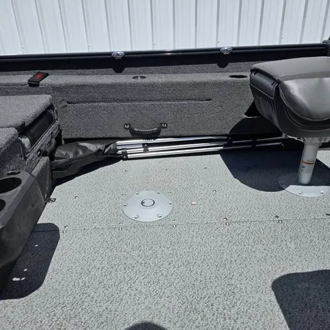 Slide: The Image of 2025 Lund 1775 Adventure Sport boat interior with seating and storage compartments. - 15