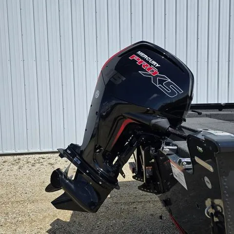 Slide: The Image of 2025 Lund 1775 Adventure Sport with Mercury Pro XS outboard motor, parked outdoors. - 3