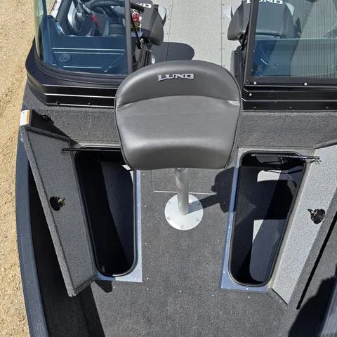 Slide: The Image of 2025 Lund 1775 Adventure Sport boat interior with seating and storage compartments. - 7