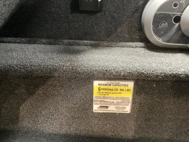 Slide: The Image of 2024 Lund 1650 Rebel XL SS boat capacity label, maximum 6 persons or 800 lbs. - 10