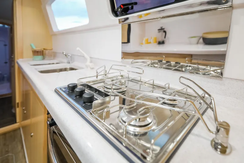 Slide: The Image of Modern kitchen in 2025 Seawind 1260 yacht with stainless steel stove and sink. - 25