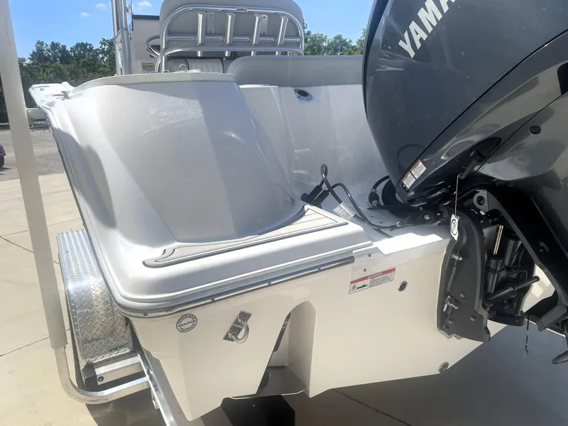 Slide: The Image of 2023 Sea Fox 228 Commander boat with Yamaha engine, rear view. - 11