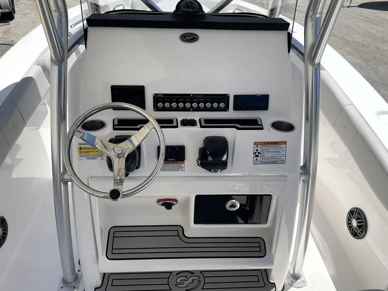 Slide: The Image of 2023 Sea Fox 228 Commander boat console with steering wheel and control panel. - 27