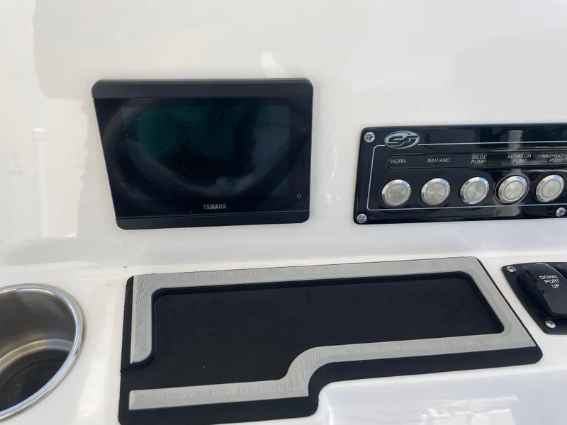 Slide: The Image of 2023 Sea Fox 228 Commander dashboard with Yamaha display and control panel. - 29