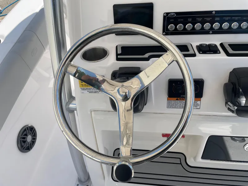 Slide: The Image of Steering wheel of 2023 Sea Fox 228 Commander boat with control panel. - 33