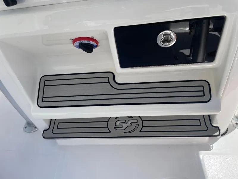 Slide: The Image of 2023 Sea Fox 228 Commander boat console with storage and control panel. - 34