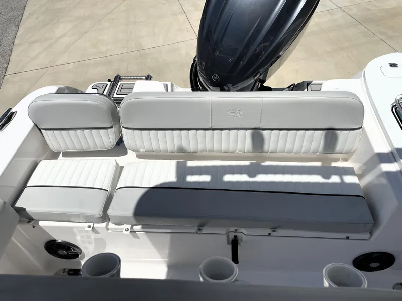 Slide: The Image of 2023 Sea Fox 228 Commander boat seating area with engine view. - 36