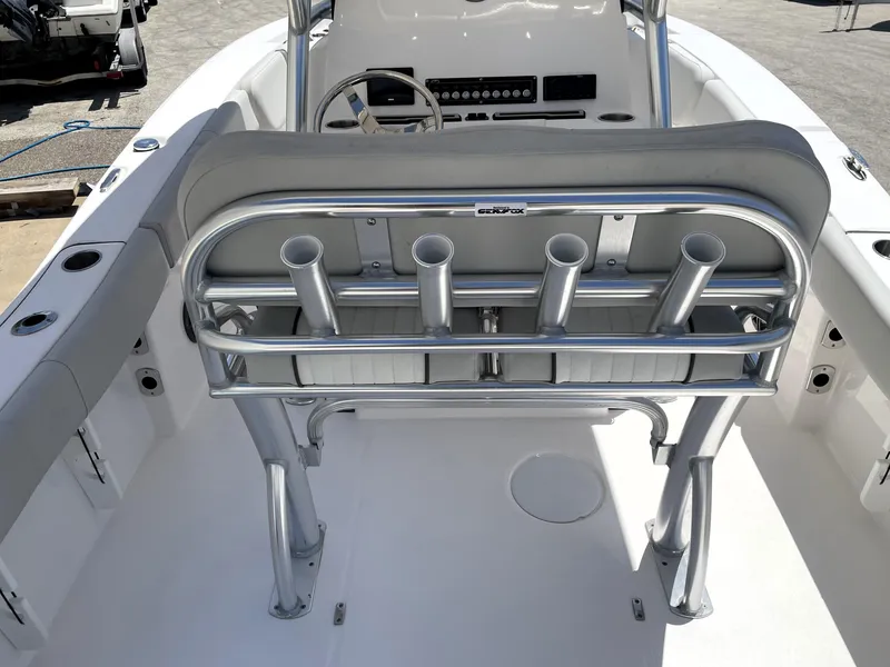 Slide: The Image of 2023 Sea Fox 228 Commander boat interior with rod holders and steering console. - 38