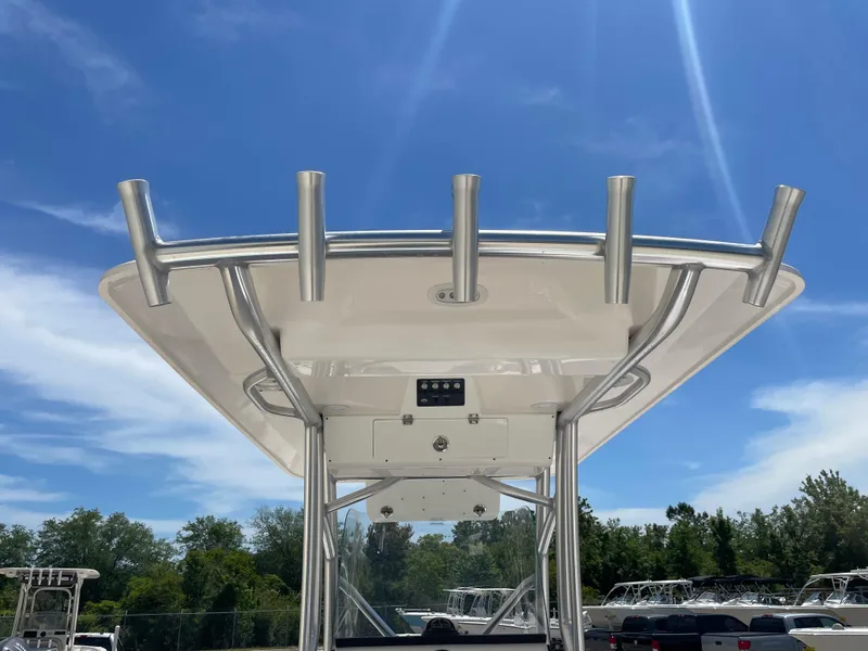 Slide: The Image of 2023 Sea Fox 228 Commander boat with T-top under clear blue sky. - 39