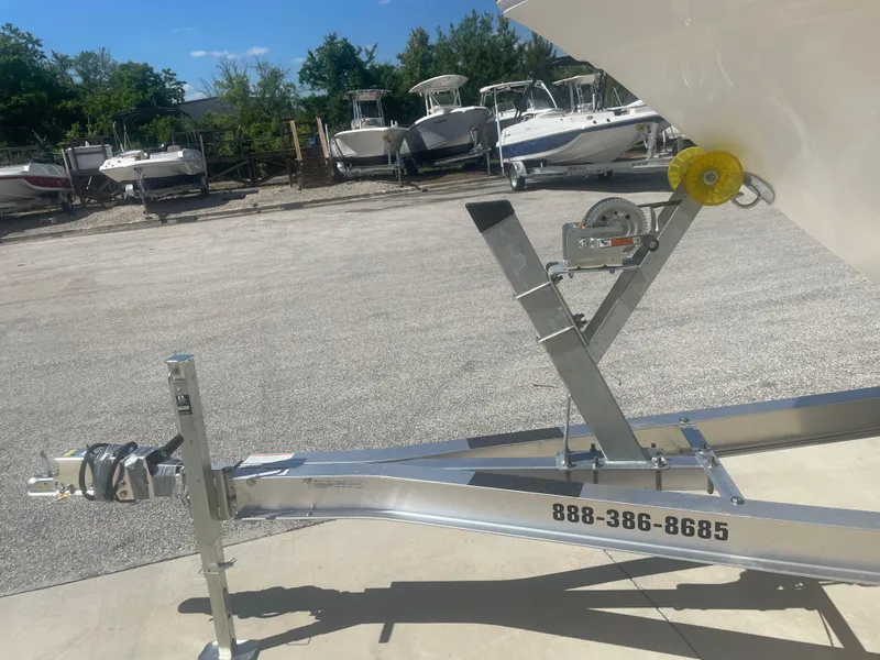 Slide: The Image of Trailer for 2023 Sea Fox 228 Commander boat in a marina setting. - 44