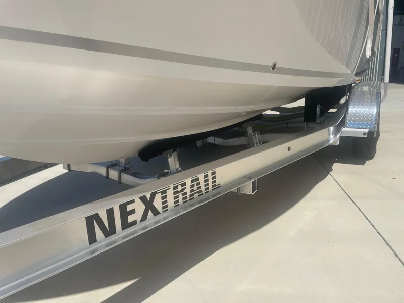 Slide: The Image of 2023 Sea Fox 228 Commander boat on Nextrail trailer, side view. - 45