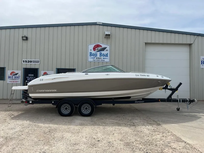 Slide: The Image of 2008 Chaparral 220 SSi boat on trailer outside Boji Boat Brokers building. - 0