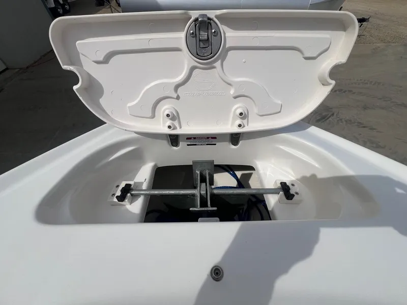 Slide: The Image of Open anchor compartment of 2008 Chaparral 220 SSi boat, showing storage space. - 11