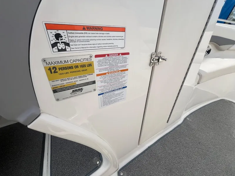 Slide: The Image of 2008 Chaparral 220 SSi boat capacity warning labels, maximum 12 persons or 1625 lbs. - 16