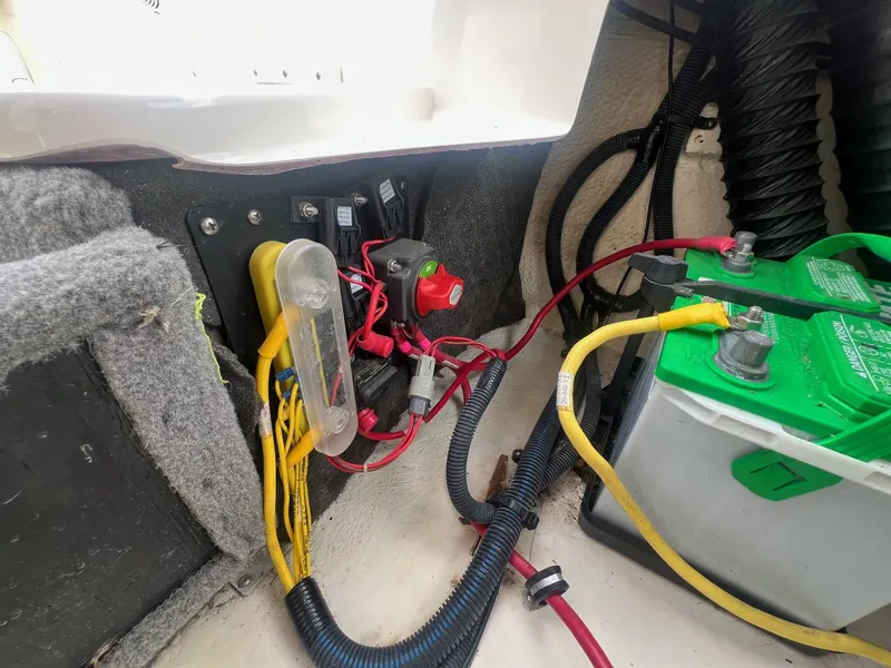 Slide: The Image of Electrical system and battery setup in a 2008 Chaparral 220 SSi boat. - 23