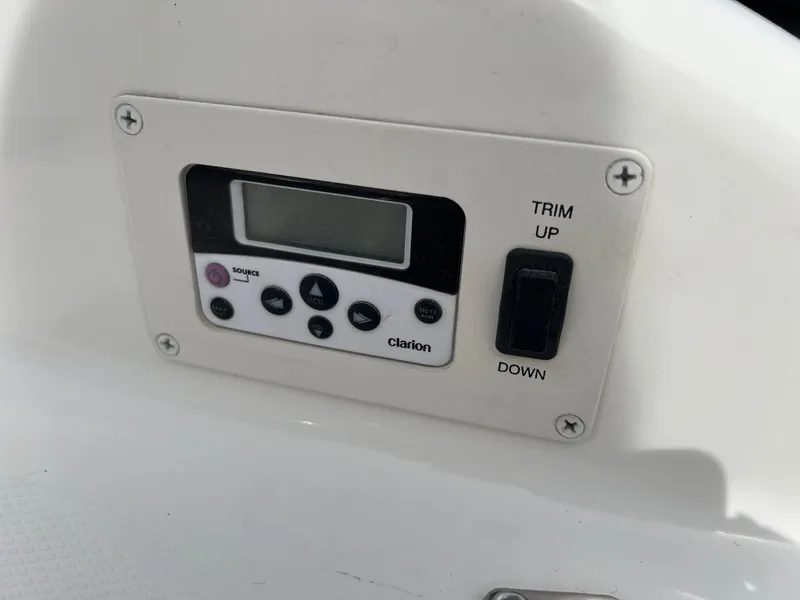 Slide: The Image of Control panel on 2008 Chaparral 220 SSi boat with Clarion audio system. - 26