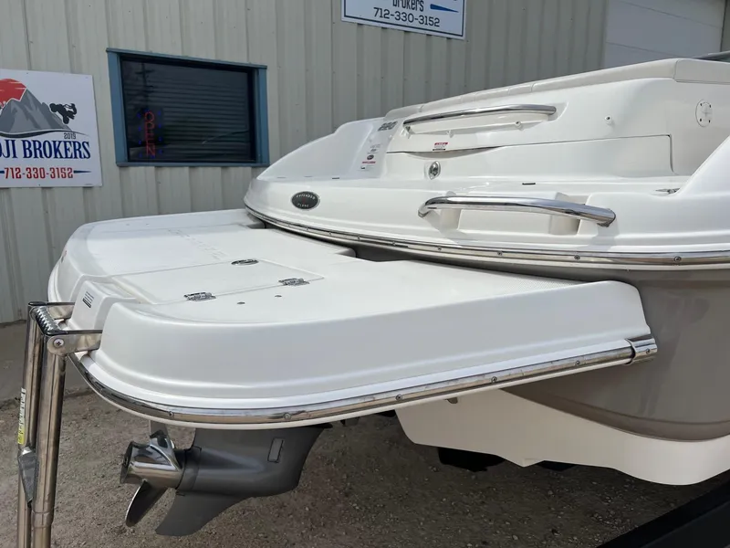 Slide: The Image of 2008 Chaparral 220 SSi boat stern with swim platform and outboard motor. - 27