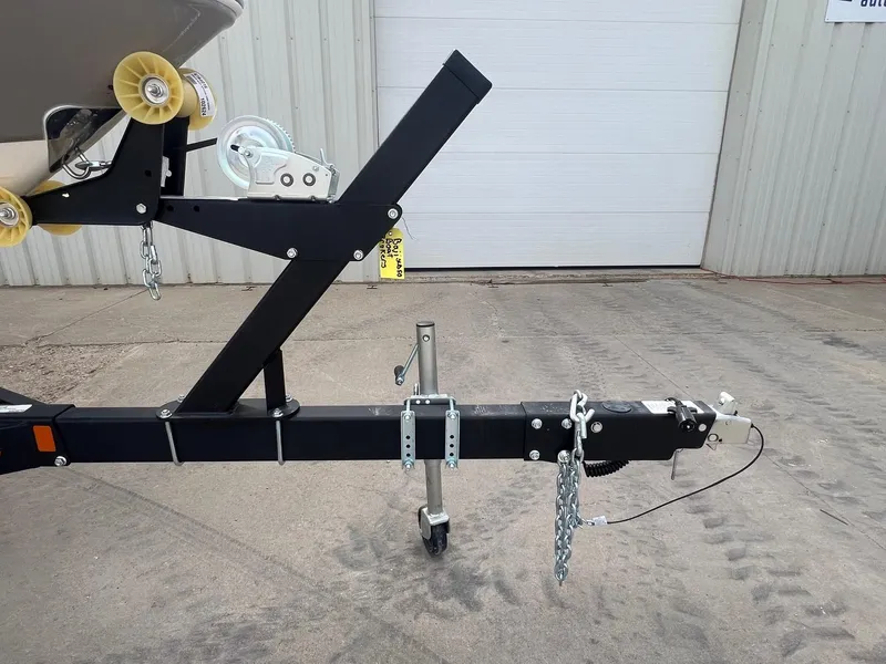 Slide: The Image of Trailer hitch of a 2008 Chaparral 220 SSi boat, parked on concrete. - 30