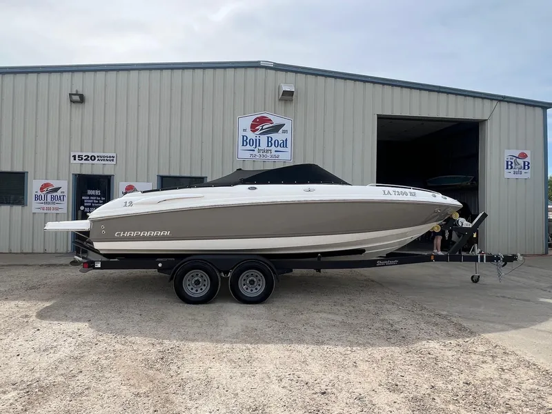 Slide: The Image of 2008 Chaparral 220 SSi boat on trailer outside Boji Boat Brokers building. - 31